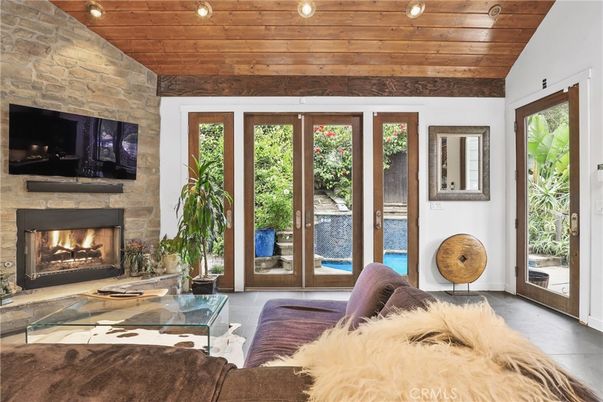 Fireplace, Interior, Living room, Recessed Lighting, Stone Walls, Wooden Ceilings