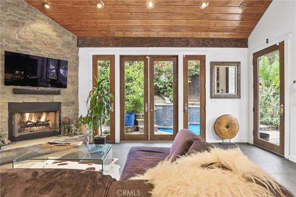 Fireplace, Interior, Living room, Recessed Lighting, Stone Walls, Wooden Ceilings