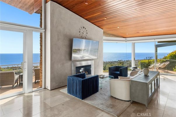 Fireplace, Interior, Living room, Recessed Lighting, Water, Wooden Ceilings