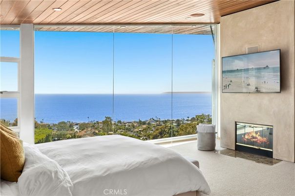 Bedroom, Fireplace, Interior, Recessed Lighting, Water, Wooden Ceilings