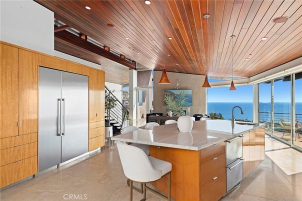 Dining room, Interior, Kitchen, Pendant Lights, Recessed Lighting, Stainless Steel Appliances, Water, Wooden Ceilings