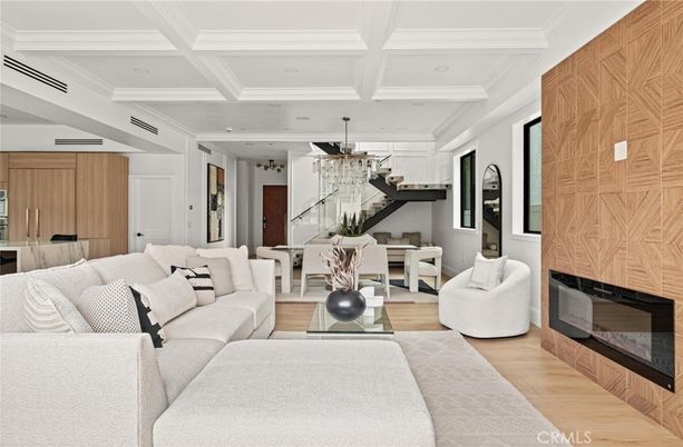 Chandelier, Dining room, Fireplace, Interior, Living room, Recessed Lighting, Wood Texture Flooring