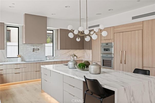 Interior, Kitchen, Marble Walls, Pendant Lights, Recessed Lighting, Stainless Steel Appliances, Wood Texture Flooring