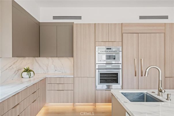 Interior, Kitchen, Marble Walls, Stainless Steel Appliances, Wood Texture Flooring