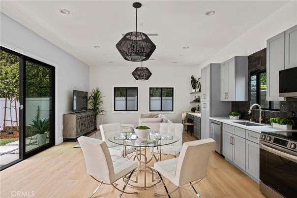 Dining room, Interior, Kitchen, Pendant Lights, Recessed Lighting, Stainless Steel Appliances, Wood Texture Flooring