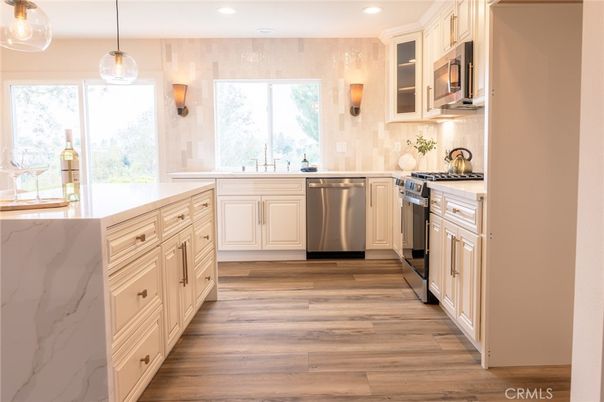Interior, Kitchen, Pendant Lights, Recessed Lighting, Stainless Steel Appliances, Wood Texture Flooring