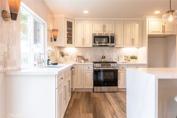 Interior, Kitchen, Pendant Lights, Recessed Lighting, Stainless Steel Appliances, Wood Texture Flooring