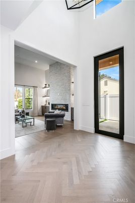 Fireplace, Interior, Living room, Recessed Lighting, Stone Walls, Wood Texture Flooring