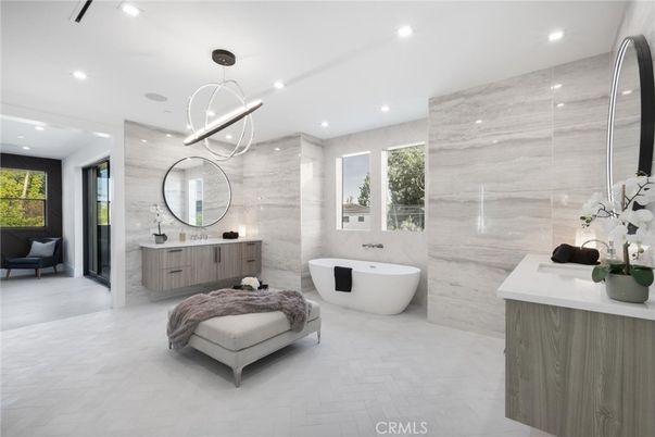 Bathroom, Dual Sink Vanities, Free Standing Baths, Glass Shower, Interior, Marble Walls, Pendant Lights, Recessed Lighting