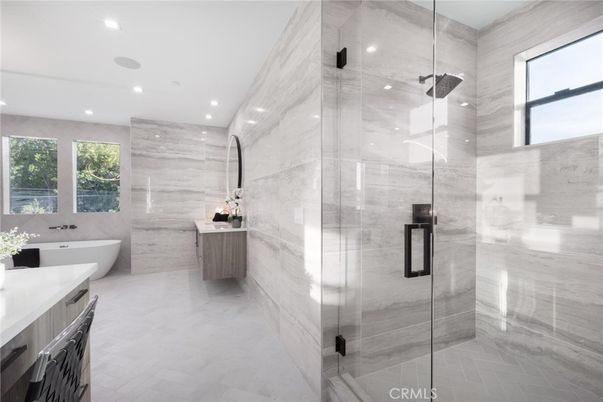Bathroom, Free Standing Baths, Glass Shower, Interior, Marble Walls, Recessed Lighting, Wood Texture Flooring