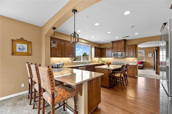 Dining room, Interior, Kitchen, Pendant Lights, Recessed Lighting, Stainless Steel Appliances, Wood Texture Flooring