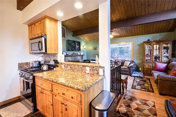 Interior, Kitchen, Living room, Recessed Lighting, Stainless Steel Appliances, Wooden Beams, Wooden Ceilings, Wood Texture Flooring