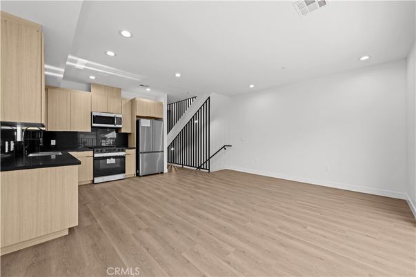 Interior, Kitchen, Recessed Lighting, Stainless Steel Appliances, Wood Texture Flooring