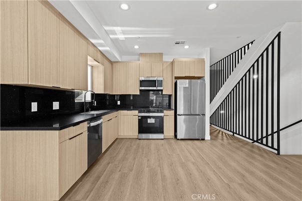 Interior, Kitchen, Recessed Lighting, Stainless Steel Appliances, Wood Texture Flooring