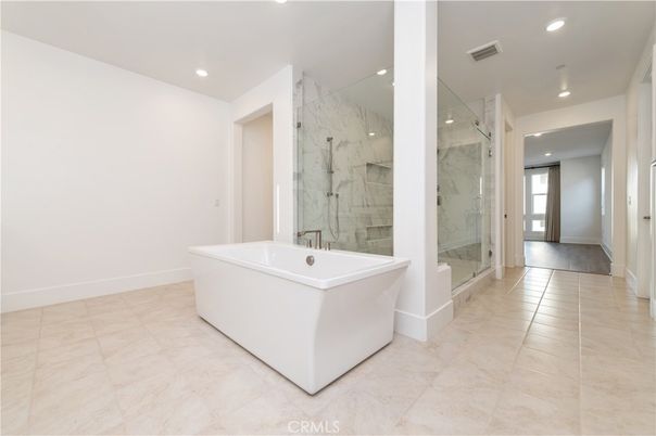 Bathroom, Free Standing Baths, Glass Shower, Interior, Marble Walls, Recessed Lighting