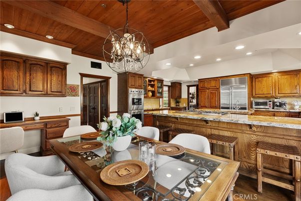 Chandelier, Dining room, Interior, Kitchen, Recessed Lighting, Stainless Steel Appliances, Wooden Beams, Wooden Ceilings, Wood Texture Flooring