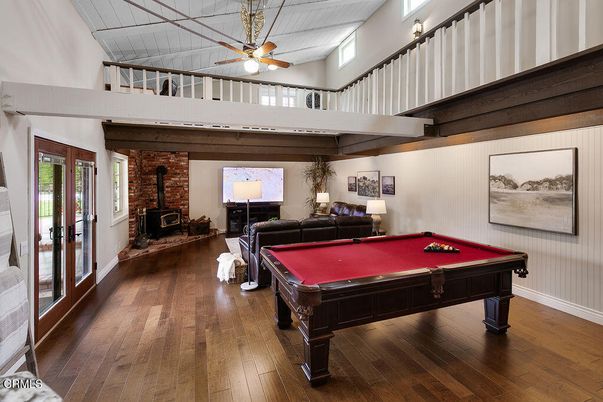 Billiard Table, Fireplace, Game Room, Interior, Stone Walls, Wood Texture Flooring