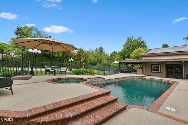 Exterior, Pool, Solar Panels