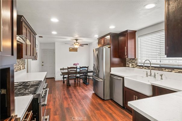 Dining room, Interior, Kitchen, Recessed Lighting, Stainless Steel Appliances, Wood Texture Flooring