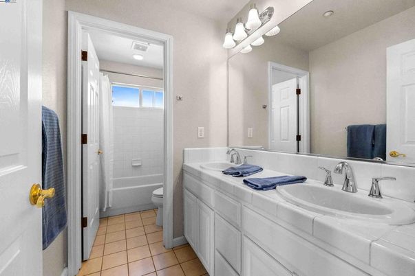 Bathroom, Dual Sink Vanities, Interior, Recessed Lighting, Tile Countertops