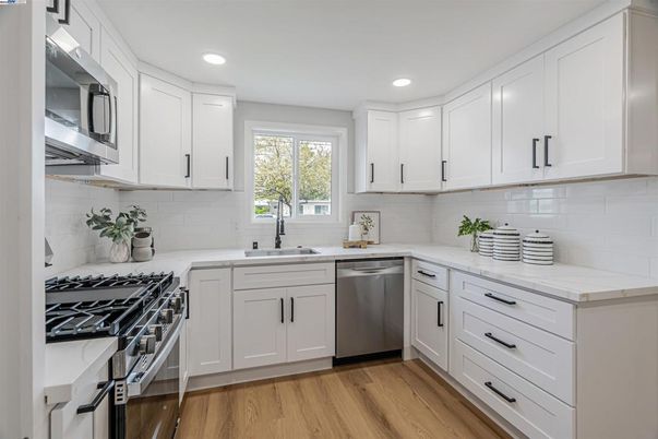Interior, Kitchen, Recessed Lighting, Stainless Steel Appliances, Wood Texture Flooring