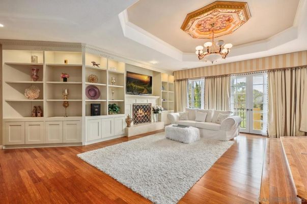 Chandelier, Fireplace, Interior, Living room, Recessed Lighting, Wood Texture Flooring