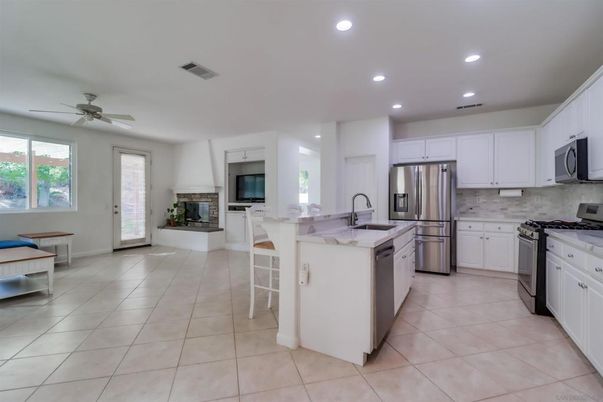 Fireplace, Interior, Kitchen, Recessed Lighting, Stainless Steel Appliances
