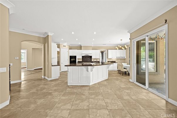 Chandelier, Dining room, Interior, Kitchen, Pendant Lights, Recessed Lighting, Stainless Steel Appliances
