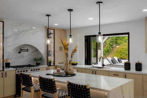 Interior, Kitchen, Marble Walls, Pendant Lights, Recessed Lighting, Stainless Steel Appliances