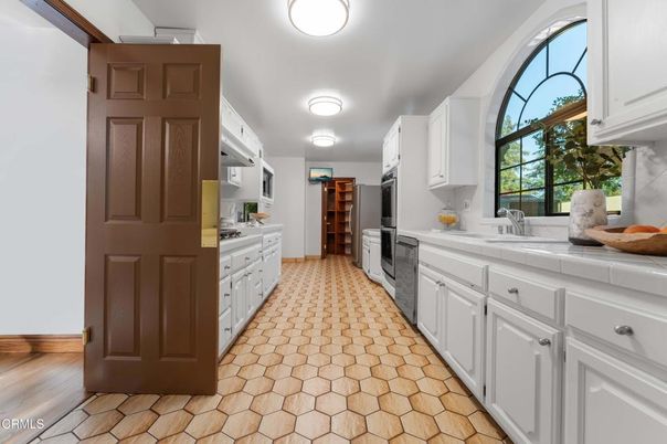 Interior, Kitchen, Tile Countertops, Wood Texture Flooring