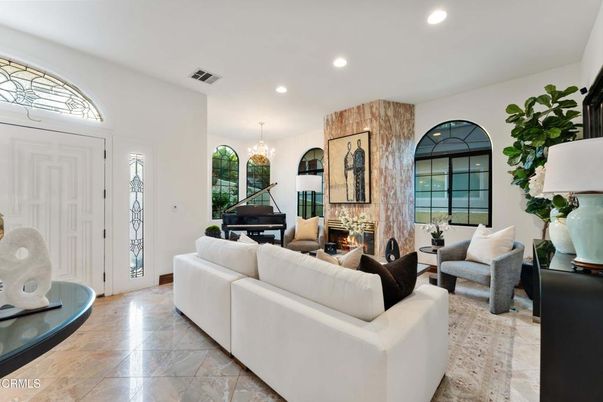 Chandelier, Fireplace, Interior, Living room, Piano, Recessed Lighting