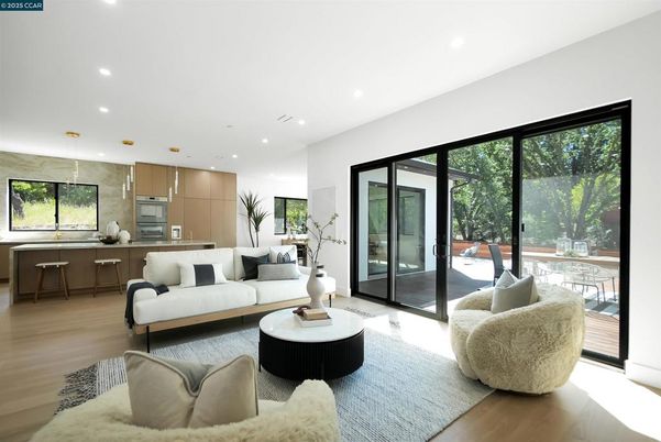 Interior, Kitchen, Living room, Marble Walls, Pendant Lights, Recessed Lighting, Stainless Steel Appliances, Wood Texture Flooring