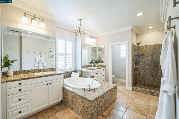 Bathroom, Chandelier, Dual Sink Vanities, Glass Shower, Interior, Recessed Lighting