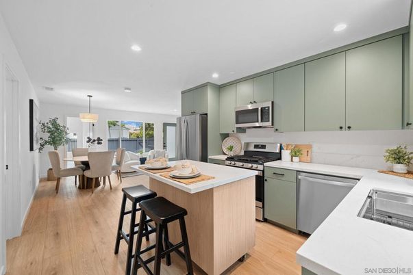 Dining room, Interior, Kitchen, Pendant Lights, Recessed Lighting, Stainless Steel Appliances, Wood Texture Flooring