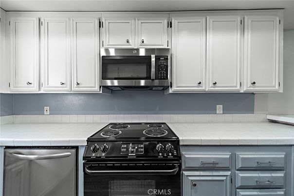 Interior, Kitchen, Stainless Steel Appliances, Tile Countertops