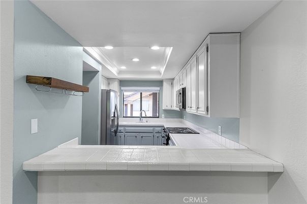 Interior, Kitchen, Recessed Lighting, Tile Countertops