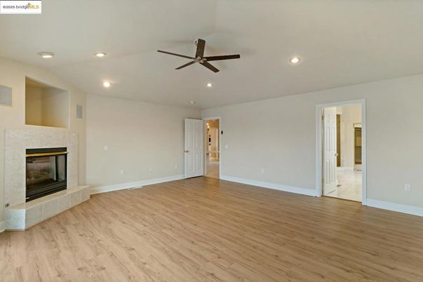 Empty room, Fireplace, Interior, Recessed Lighting, Wood Texture Flooring