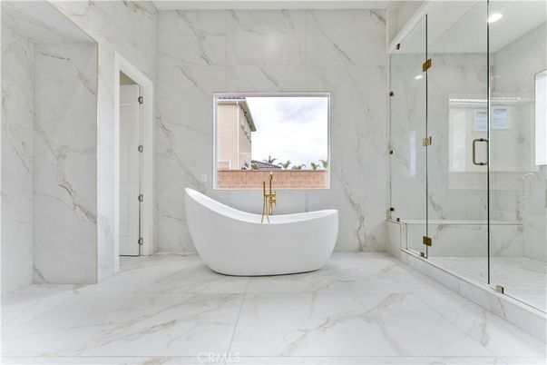 Bathroom, Free Standing Baths, Glass Shower, Interior, Marble, Marble Walls, Recessed Lighting