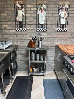 Interior, Stainless Steel Appliances, Stone Walls, Wood Texture Flooring