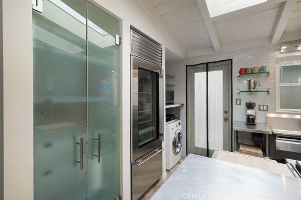 Interior, Kitchen, Stainless Steel Appliances, Stone Walls, Washer