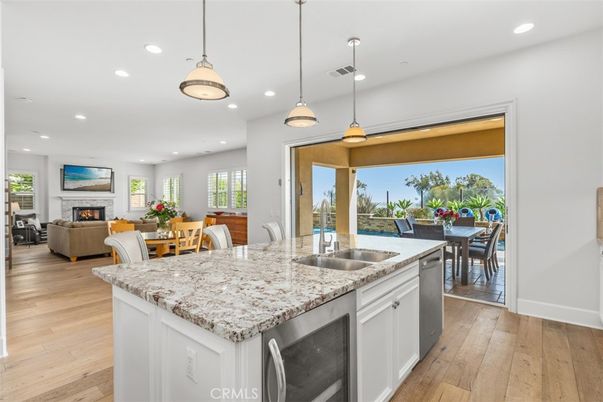 Dining room, Fireplace, Interior, Kitchen, Living room, Pendant Lights, Recessed Lighting, Wood Texture Flooring