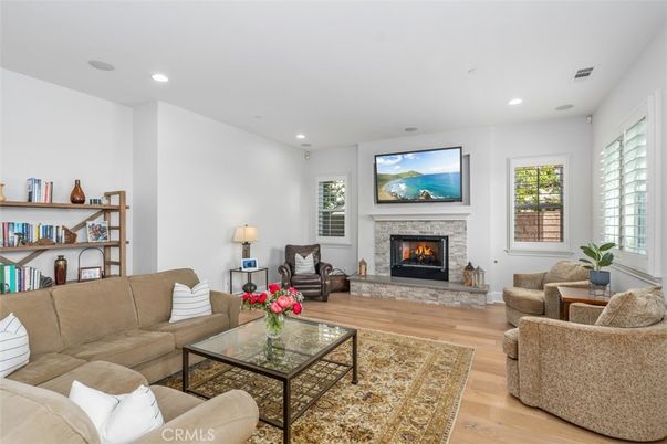 Fireplace, Interior, Living room, Recessed Lighting, Wood Texture Flooring
