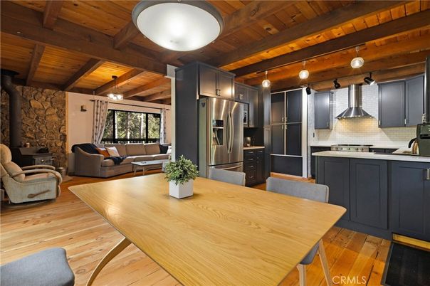 Dining room, Interior, Kitchen, Living room, Pendant Lights, Stainless Steel Appliances, Stone Walls, Wooden Beams, Wooden Ceilings, Wood Texture Flooring