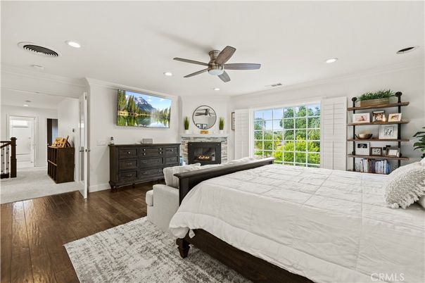 Bedroom, Fireplace, Interior, Recessed Lighting, Wood Texture Flooring