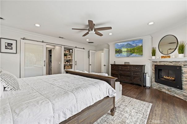Bedroom, Fireplace, Interior, Recessed Lighting, Wood Texture Flooring