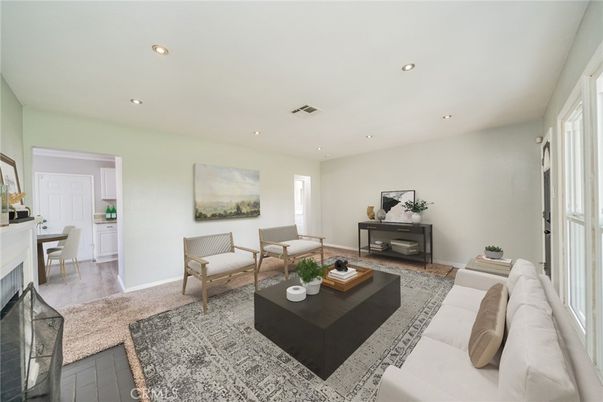 Dining room, Fireplace, Interior, Living room, Recessed Lighting, Wood Texture Flooring