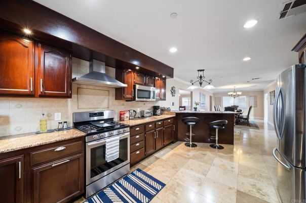 Chandelier, Dining room, Interior, Kitchen, Pendant Lights, Recessed Lighting, Stainless Steel Appliances