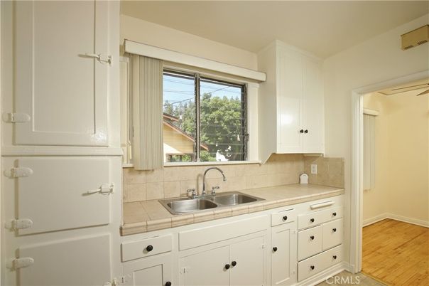 Interior, Kitchen, Tile Countertops, Wood Texture Flooring
