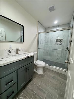 Bathroom, Glass Shower, Interior, Marble Walls, Recessed Lighting, Wood Texture Flooring