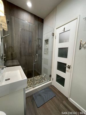 Bathroom, Glass Shower, Interior, Recessed Lighting, Wood Texture Flooring